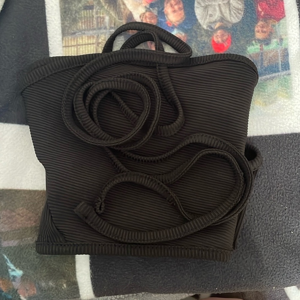 Black little wrap top. Size M. Never worn, same as the blue one in the picture.